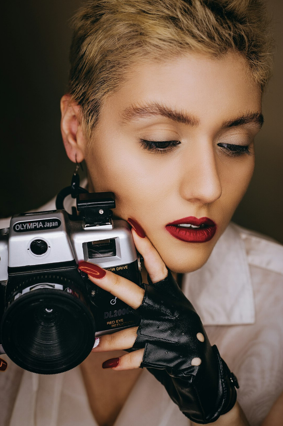 Danish female photographer with short blonde hair