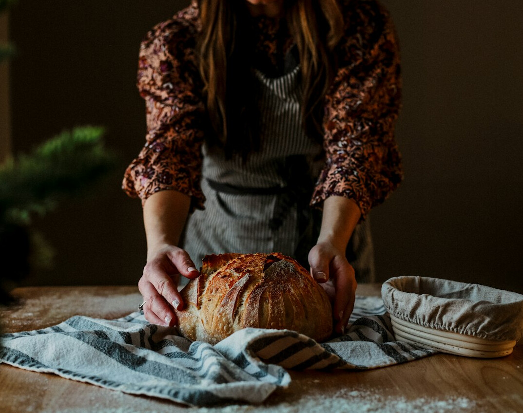 woman baking traditional bread