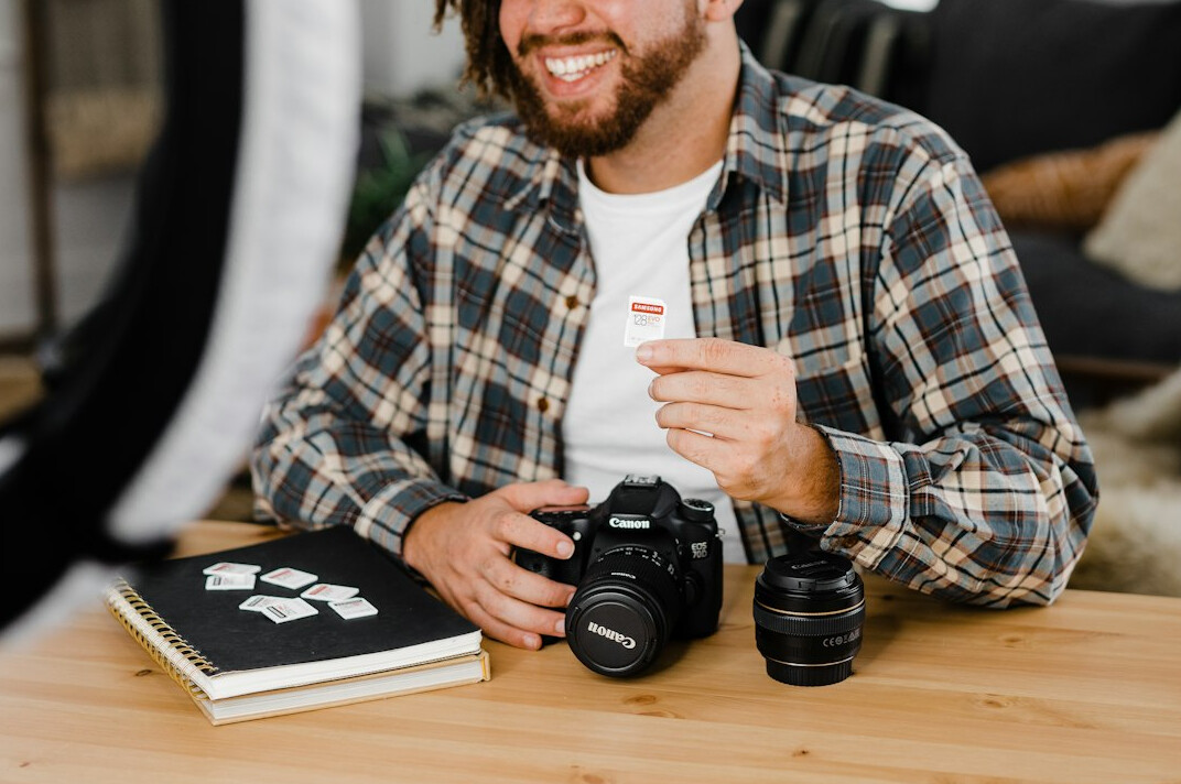 Photographer reviewing photographs on a light table